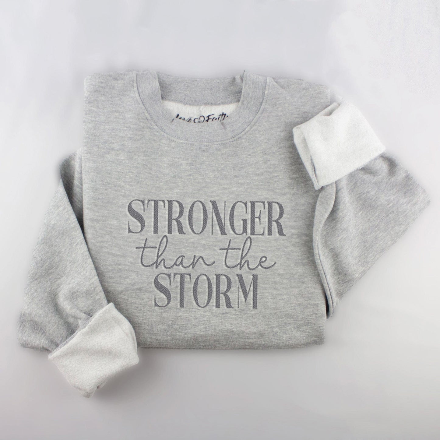 Embroidered Stronger Than The Storm Sweatshirt